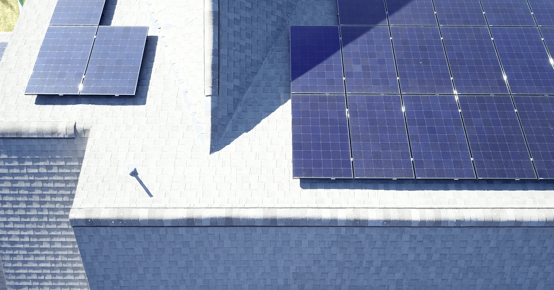 Close up drone photo of LG solar panels on roof